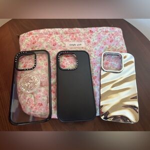 iPhone 15 Pro Casetify Black and clear cases and silver metallic case